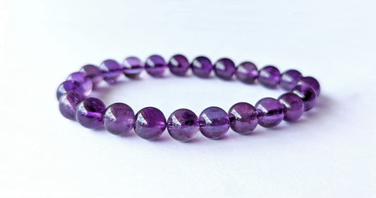Bracelet en pierres naturelles d'améthyste, qualité AA, perles de 8mm.
Lithothérapie, apporte paix intérieure et protection