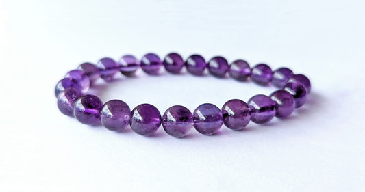 Bracelet en pierres naturelles d'améthyste, qualité AA, perles de 8mm.
Lithothérapie, apporte paix intérieure et protection
