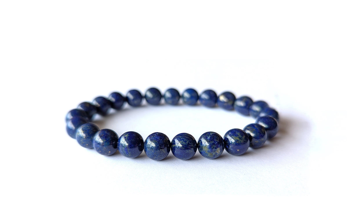 Bracelet Lapis Lazuli en pierres naturelles de 8mm de qualité AA. En lithothérapie elle apporte communication et protection