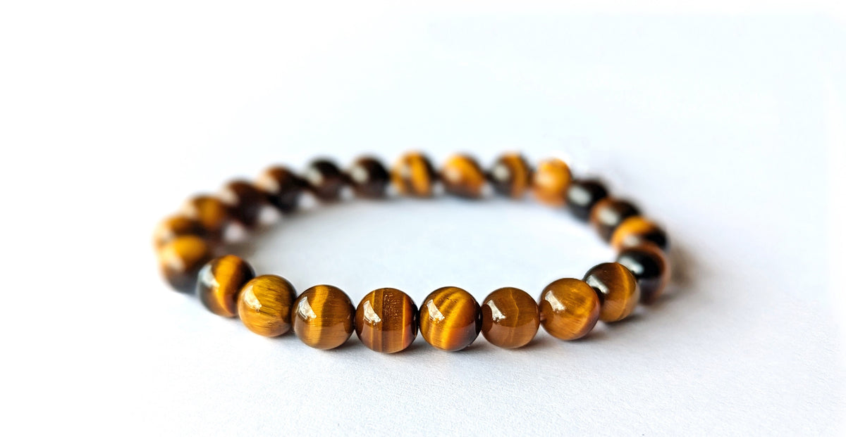 Bracelet Œil de Tigre en pierres naturelles de 8mm de qualité AA. En lithothérapie, apporte protection, courage et confiance en soi