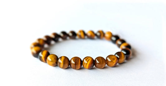 Bracelet Œil de Tigre en pierres naturelles de 8mm de qualité AA. En lithothérapie, apporte protection, courage et confiance en soi